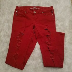 Super distressed red jeans